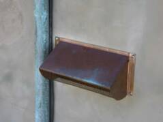 copper microwave range vent with patina
